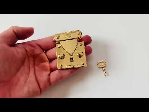 Lockit bag charm Louis Vuitton Gold in Metal - 16048257